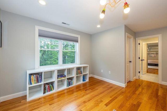 11 Liberty Ave, Burlington, MA 01803 - game room with light wood-style flooring, baseboards, and recessed lighting