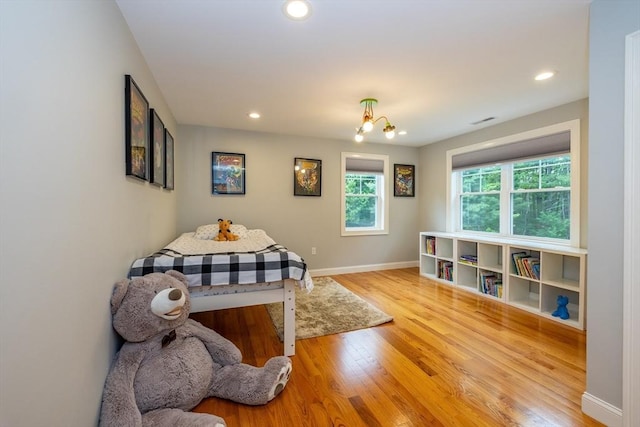 11 Liberty Ave, Burlington, MA 01803 - living area with wood finished floors, recessed lighting, and baseboards