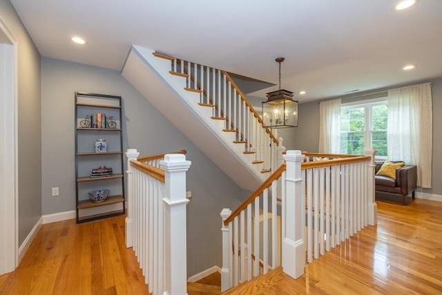11 Liberty Ave, Burlington, MA 01803 - stairs featuring wood finished floors, baseboards, and recessed lighting