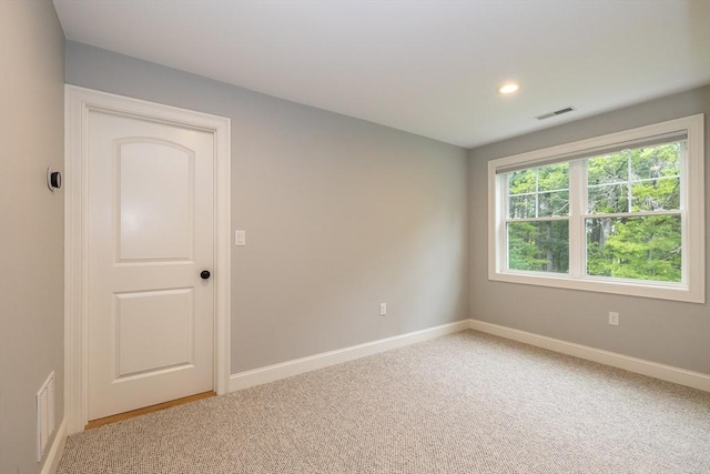 11 Liberty Ave, Burlington, MA 01803 - unfurnished room with baseboards, light colored carpet, and recessed lighting