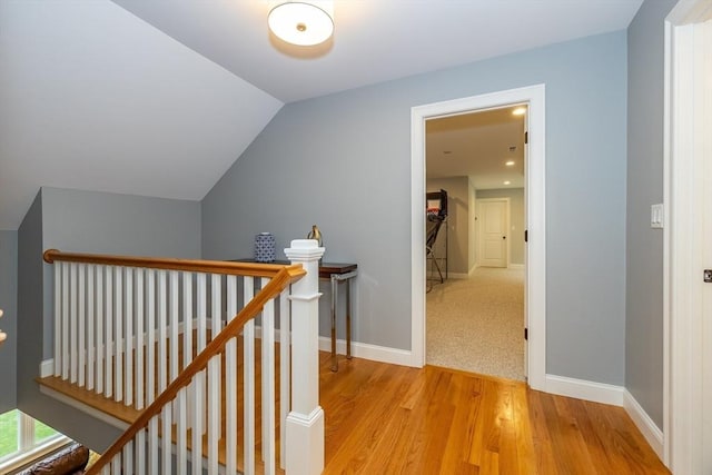 11 Liberty Ave, Burlington, MA 01803 - corridor featuring an upstairs landing, light wood-style floors, lofted ceiling, baseboards, and recessed lighting