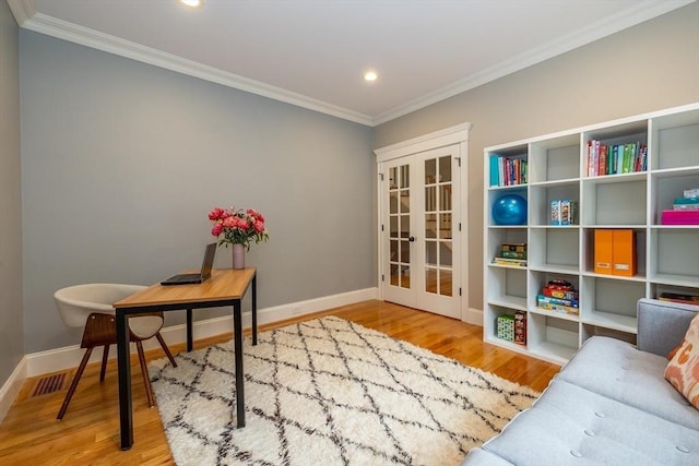 11 Liberty Ave, Burlington, MA 01803 - home office featuring crown molding, french doors, wood finished floors, recessed lighting, and baseboards