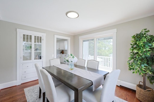 21 Trefton Dr, Braintree, MA 02184 - dining space with ornamental molding, dark wood-style floors, and baseboards