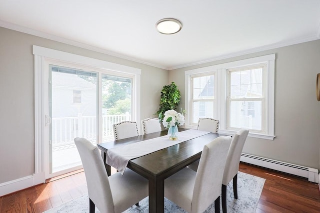 21 Trefton Dr, Braintree, MA 02184 - dining space featuring baseboard heating, ornamental molding, wood finished floors, and baseboards