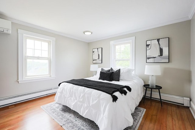 21 Trefton Dr, Braintree, MA 02184 - bedroom with a baseboard radiator, ornamental molding, wood finished floors, a wall unit AC, and baseboards