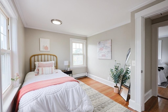 21 Trefton Dr, Braintree, MA 02184 - bedroom with wood finished floors, ornamental molding, baseboards, and baseboard heating