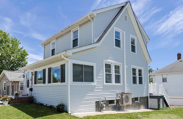 21 Trefton Dr, Braintree, MA 02184 - rear view of property with a lawn and a cooling unit