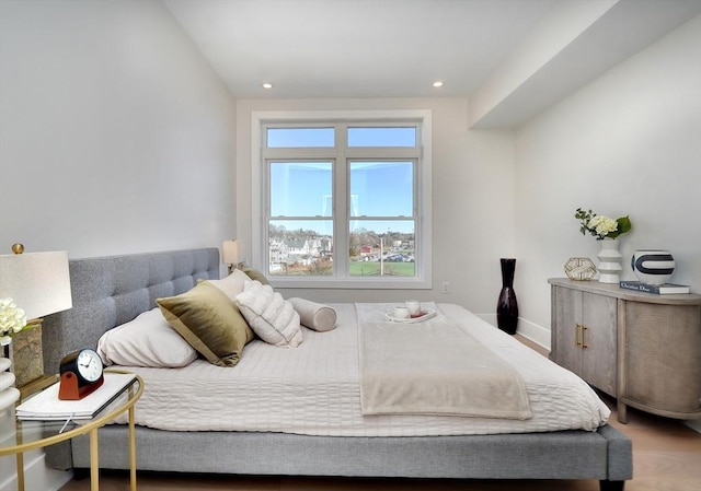 bedroom featuring hardwood / wood-style floors