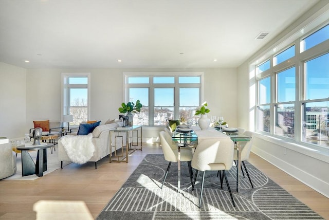 dining room featuring light hardwood / wood-style flooring