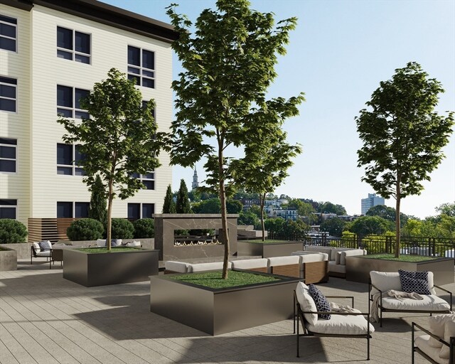 view of home's community featuring outdoor lounge area