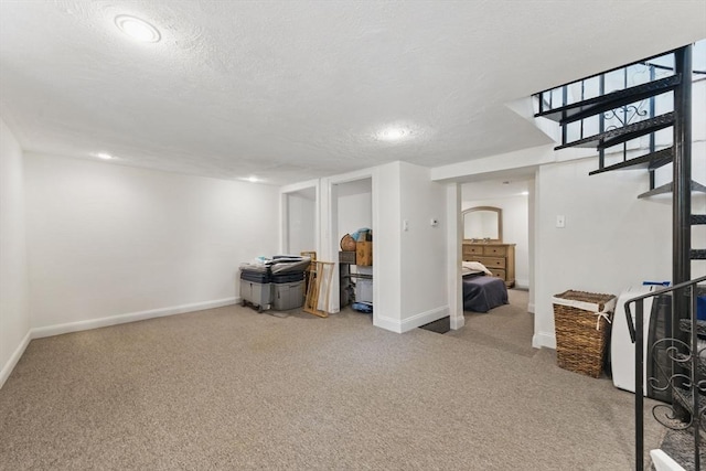 40 Chappie St Unit 1, Boston, MA 02129 - finished below grade area featuring carpet, baseboards, stairs, recessed lighting, and a textured ceiling