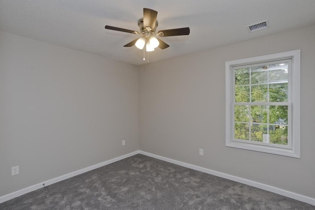 carpeted empty room with ceiling fan