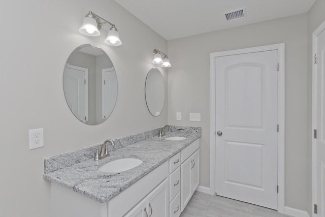 bathroom featuring vanity