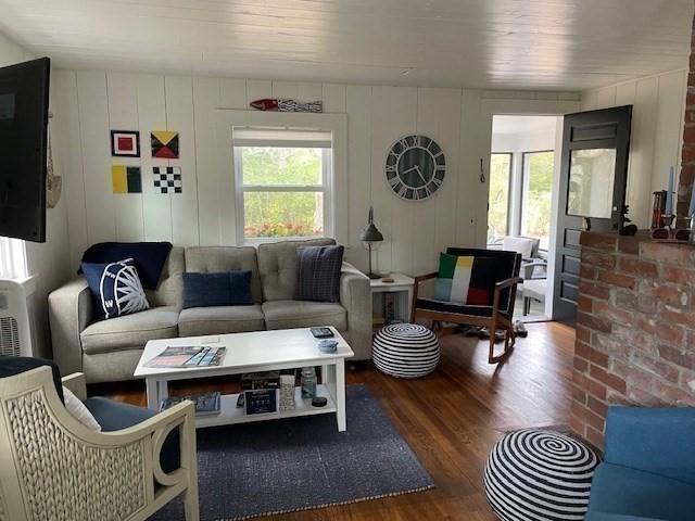 living room with wood finished floors