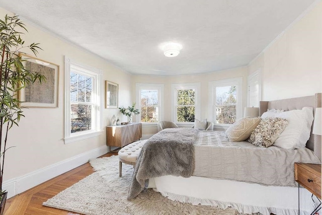 bedroom with ornamental molding