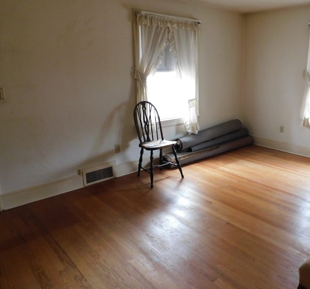 unfurnished room featuring light hardwood / wood-style flooring