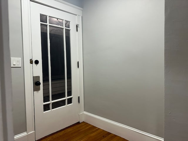 entryway with hardwood / wood-style flooring