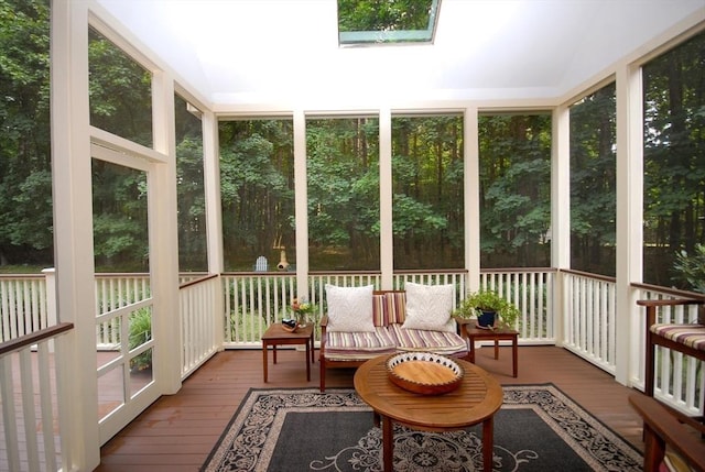 sunroom / solarium featuring a skylight