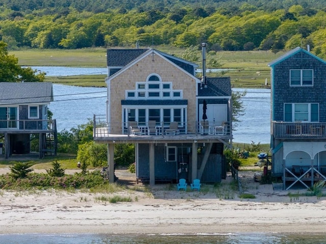 7 Cove St, Mattapoisett, MA 02739 - back of property featuring a view of trees and a deck with water view
