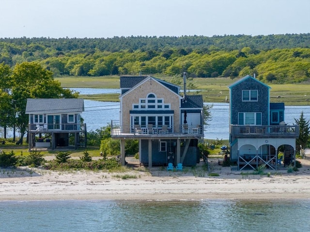 7 Cove St, Mattapoisett, MA 02739 - back of house featuring a view of trees and a deck with water view