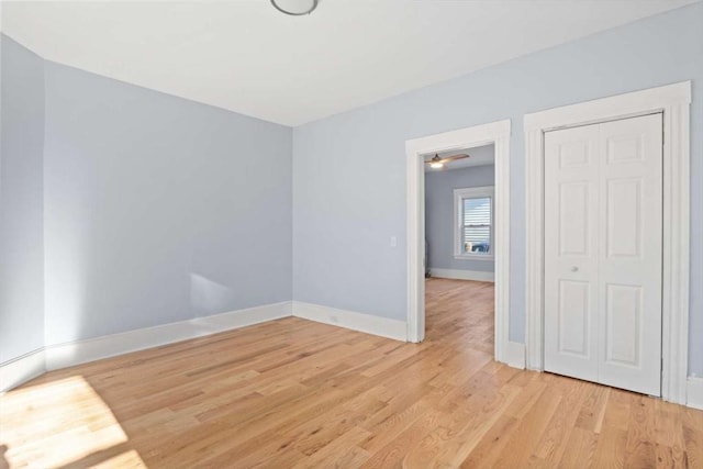 spare room featuring light hardwood / wood-style flooring