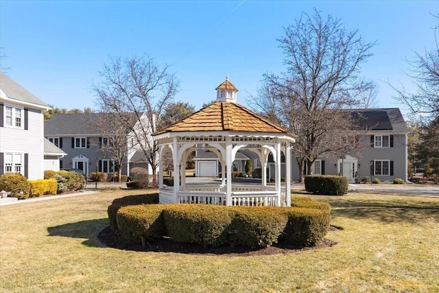 view of community with a gazebo and a lawn