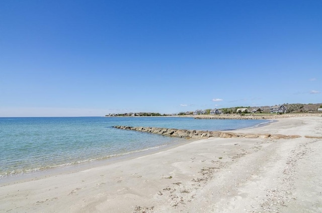 view of water feature with a beach view