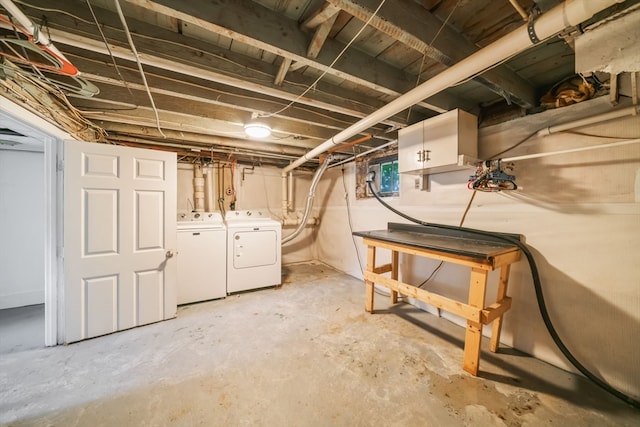 basement featuring washing machine and dryer