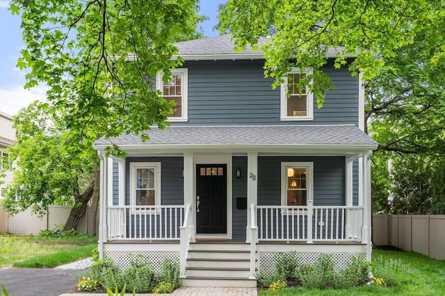 22 Carter St, Newton, MA 02460 - view of front facade with roof with shingles and covered porch