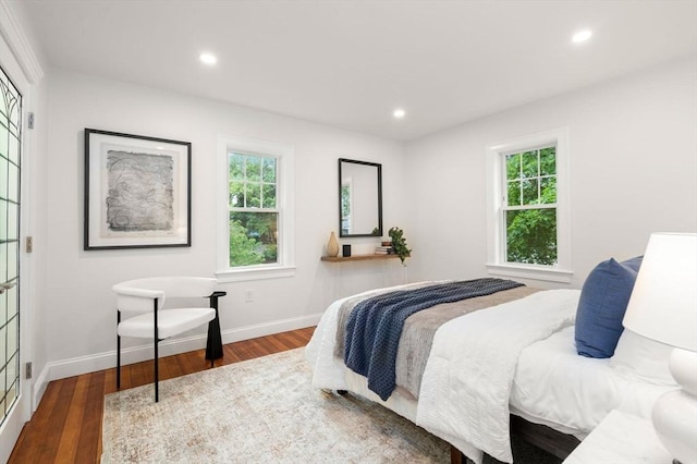 22 Carter St, Newton, MA 02460 - bedroom featuring multiple windows, wood finished floors, recessed lighting, and baseboards