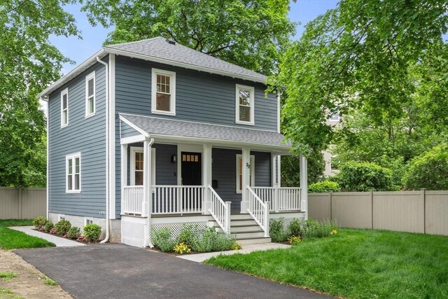 22 Carter St, Newton, MA 02460 - traditional style home featuring a porch and roof with shingles
