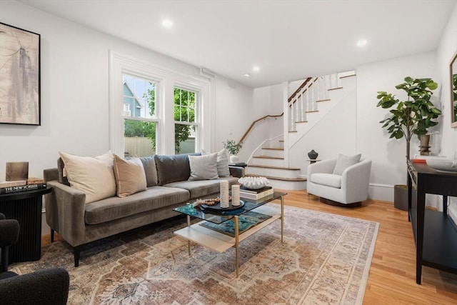 22 Carter St, Newton, MA 02460 - living area featuring stairway, light wood-style floors, recessed lighting, and baseboards