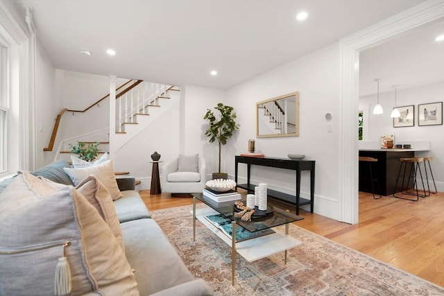 22 Carter St, Newton, MA 02460 - living area featuring stairway, wood finished floors, and recessed lighting