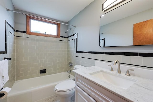 47 Forest St, Franklin, MA 02038 - bathroom with toilet, shower / tub combination, vanity, and tile walls