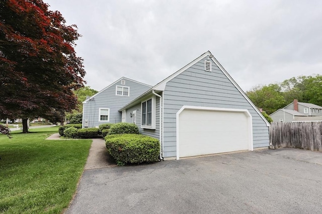 47 Forest St, Franklin, MA 02038 - view of front of property with asphalt driveway and a garage