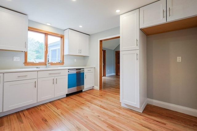 47 Forest St, Franklin, MA 02038 - kitchen featuring dishwasher, a sink, baseboards, light wood-style flooring, and recessed lighting