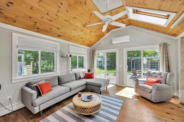 274 Morton Rd, Chatham, MA 02659 - living room featuring a baseboard radiator, a wall unit AC, plenty of natural light, a skylight, and wood ceiling