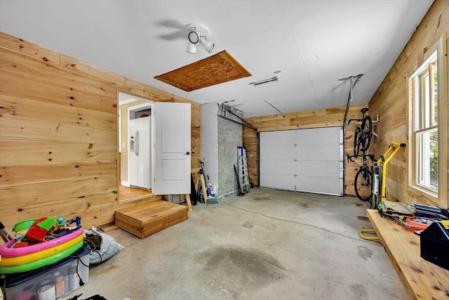 274 Morton Rd, Chatham, MA 02659 - garage featuring white refrigerator with ice dispenser and wooden walls