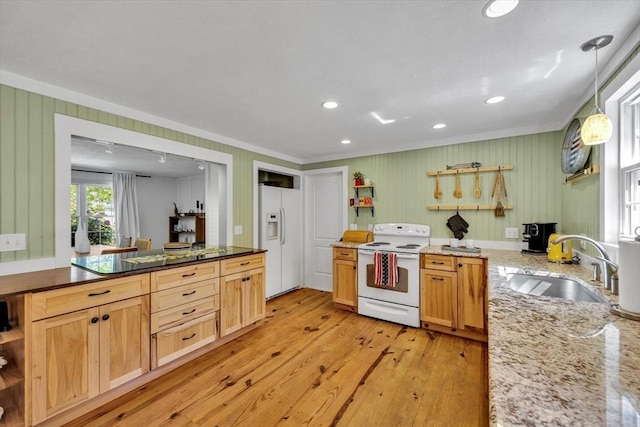 274 Morton Rd, Chatham, MA 02659 - kitchen with white appliances, ornamental molding, a sink, light wood-style flooring, and light stone counters