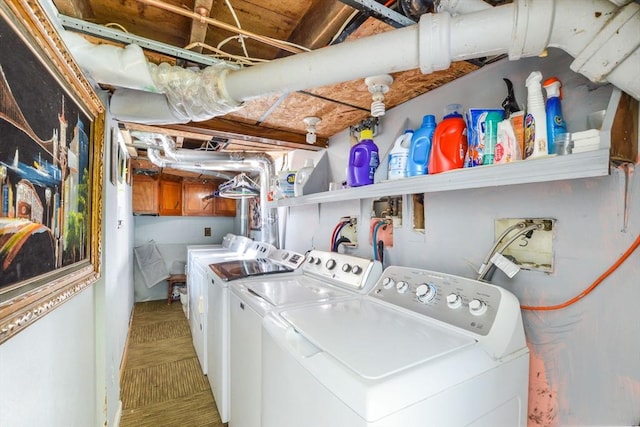 clothes washing area featuring washing machine and clothes dryer