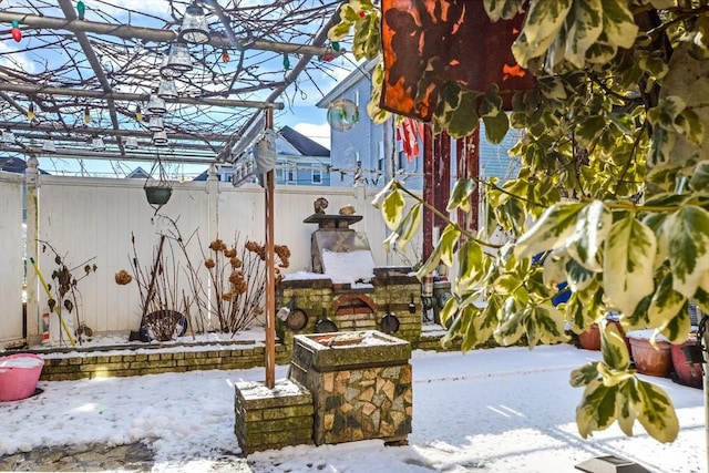 view of snow covered patio