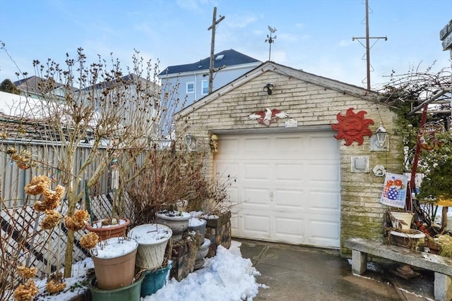 view of snow covered garage