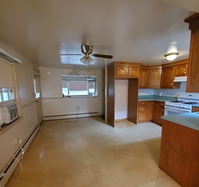 kitchen featuring ceiling fan, cooling unit, baseboard heating, and gas range gas stove