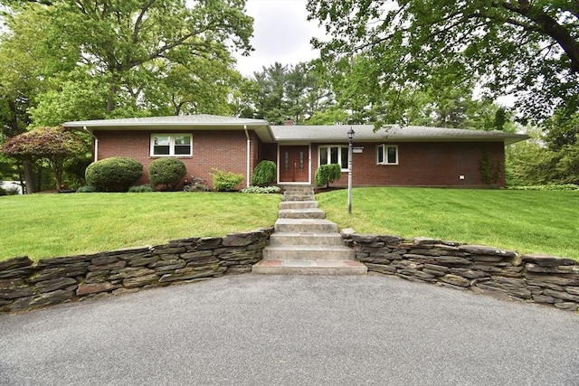 166 Primrose Dr, Longmeadow, MA 01106 - ranch-style house featuring brick siding and a front lawn
