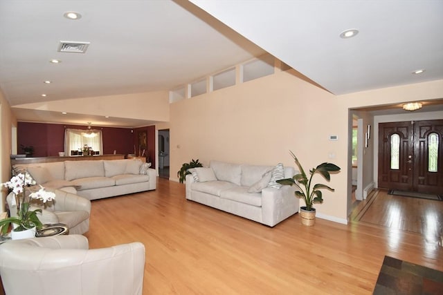166 Primrose Dr, Longmeadow, MA 01106 - living area featuring light wood-type flooring, lofted ceiling, recessed lighting, and baseboards
