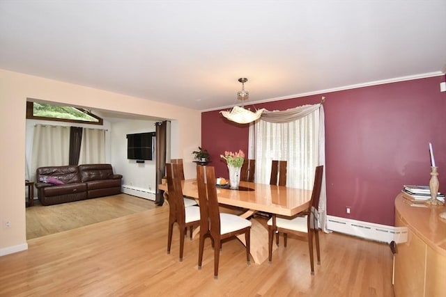 166 Primrose Dr, Longmeadow, MA 01106 - dining space with baseboard heating, light wood-style floors, and baseboards