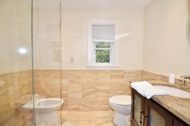 166 Primrose Dr, Longmeadow, MA 01106 - full bath with toilet, vanity, tile walls, an enclosed shower, and a wainscoted wall