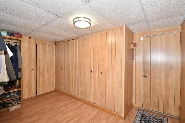 166 Primrose Dr, Longmeadow, MA 01106 - interior space with wood finished floors, a paneled ceiling, and wood walls