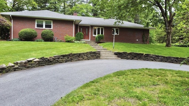 166 Primrose Dr, Longmeadow, MA 01106 - ranch-style house featuring brick siding, a chimney, and a front yard