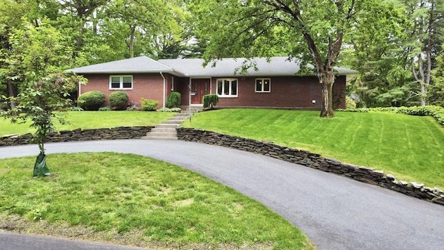166 Primrose Dr, Longmeadow, MA 01106 - single story home with a front yard and brick siding